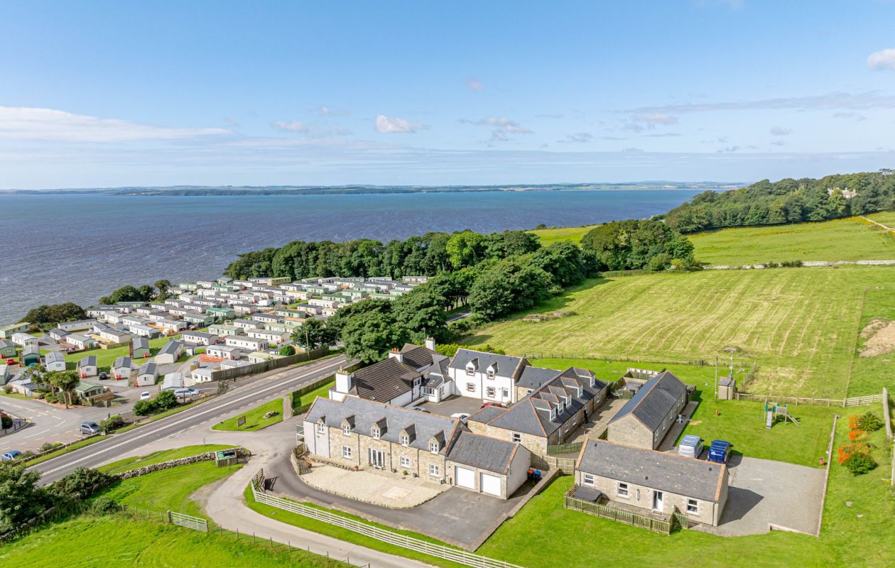 Auchenlarie Holiday Park with Galloway Cottages in the foreground